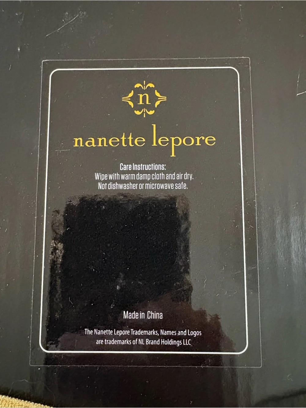 Nanette Lepore polished stainless